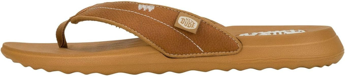 Hey Dude womens tan flip flop sandal with toe strap and cushioned sole, side view