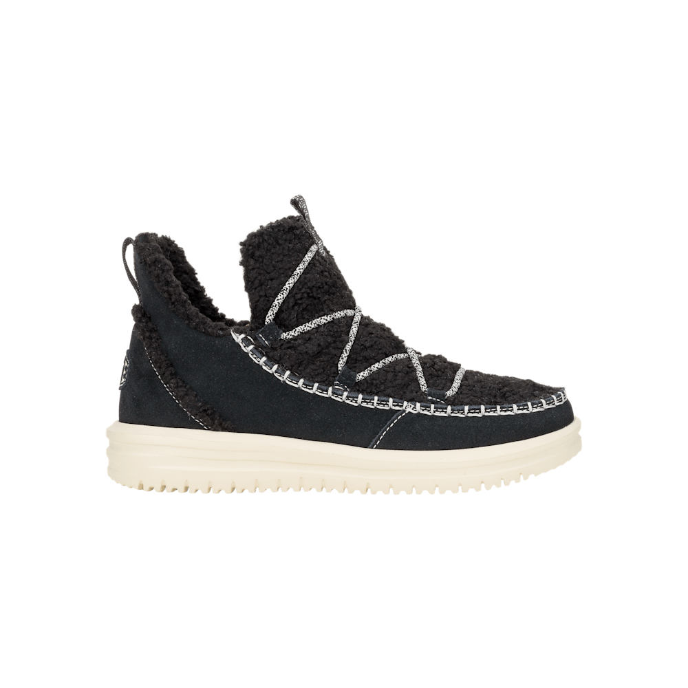 Women's slip-on boot with shearling upper, contrast lace detail, and chunky cream outsole