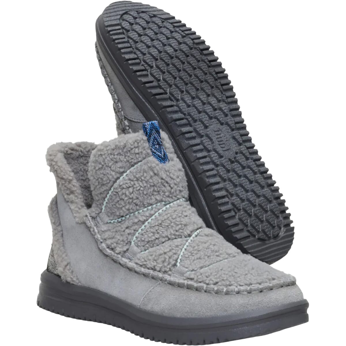 Hey Dude womens slip-on ankle boot with sherpa upper and rubber outsole shown from two angles