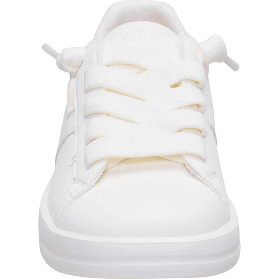 Front view of a white lace-up sneaker with flat sole and padded collar