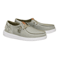 Hey Dude Wendy slip-on shoes with embroidered floral detail and tassel laces, pair angled view