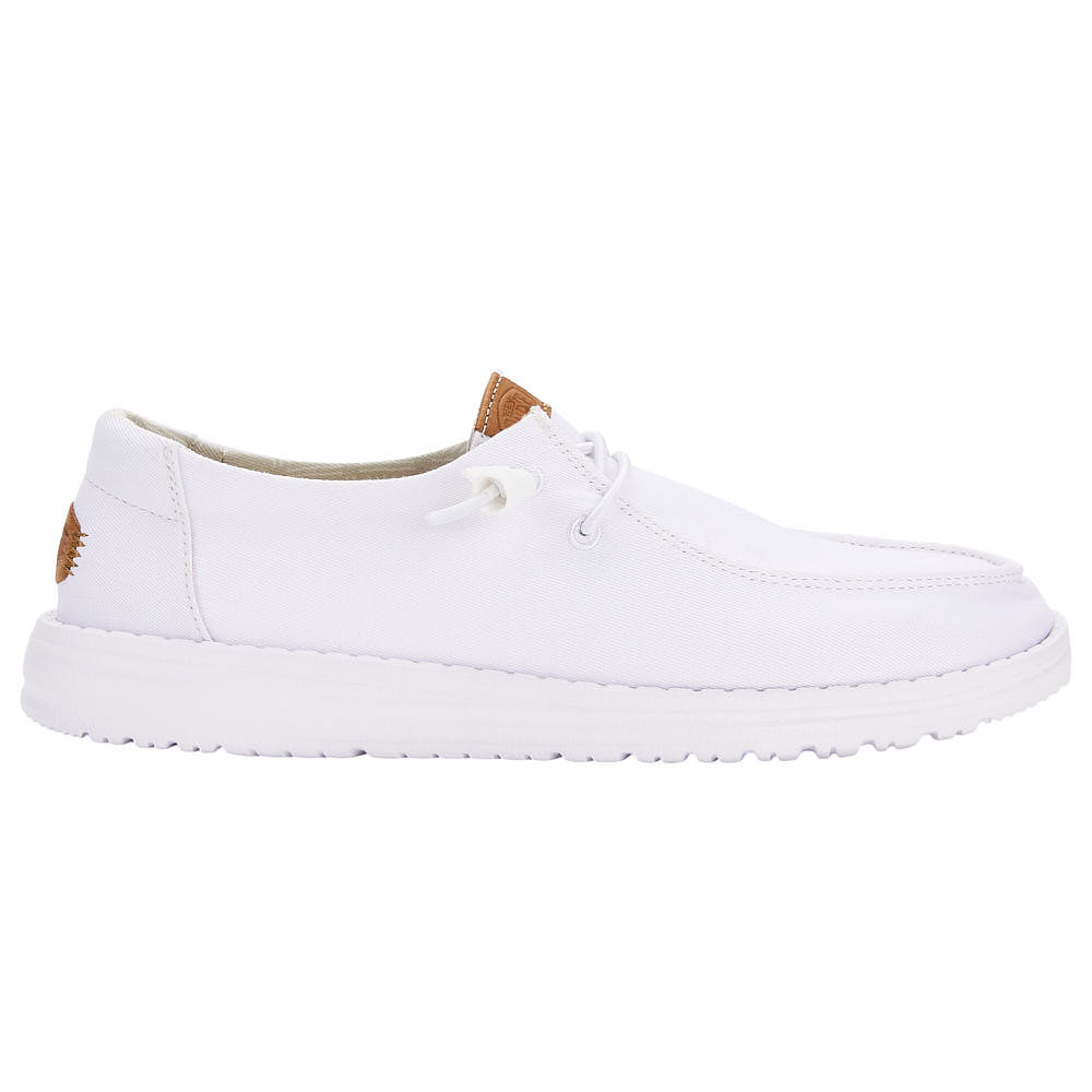 Hey Dude Wendy slip-on canvas shoe with tan leather heel accent and white sole