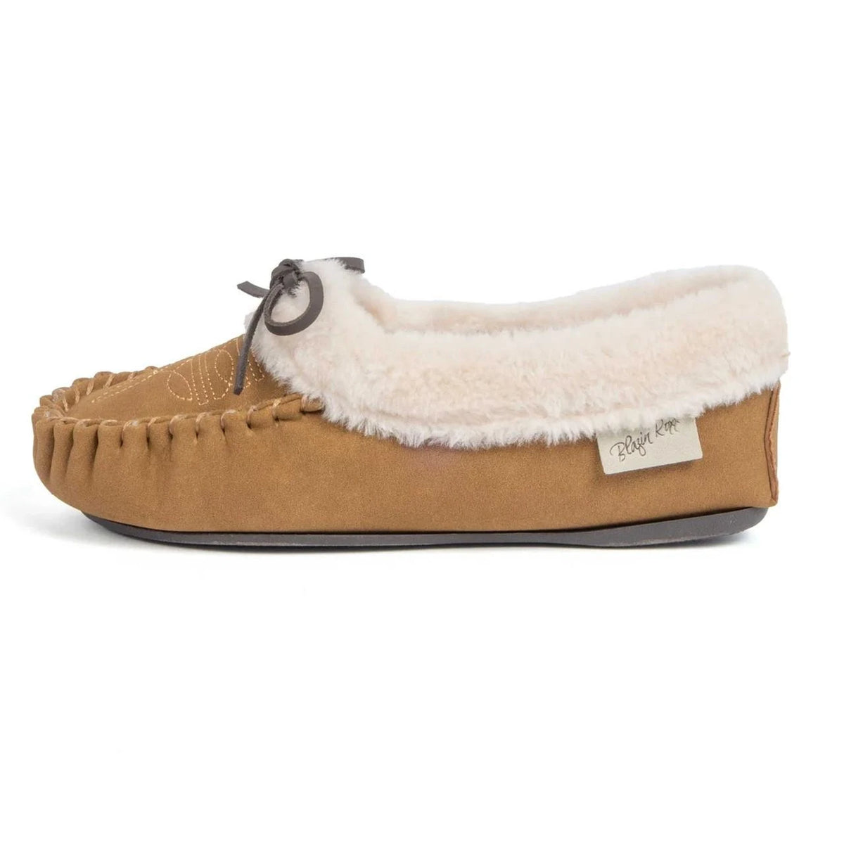 Women's moccasin slipper with sherpa fur collar, lace tie, and suede upper