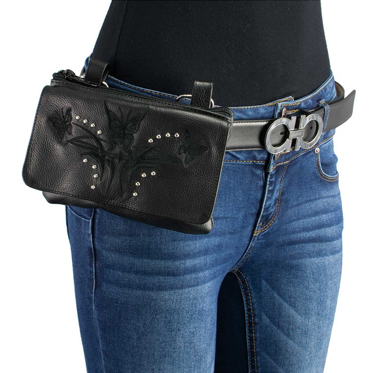 Milwaukee Corby black leather crossbody pouch worn on belt with floral embossed detail and silver studs