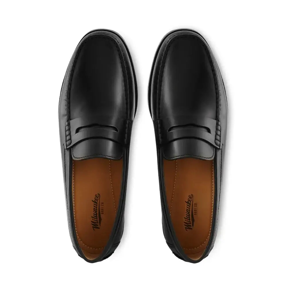 Milwaukee Dunes penny loafer in black leather shown from overhead, pair displayed side by side