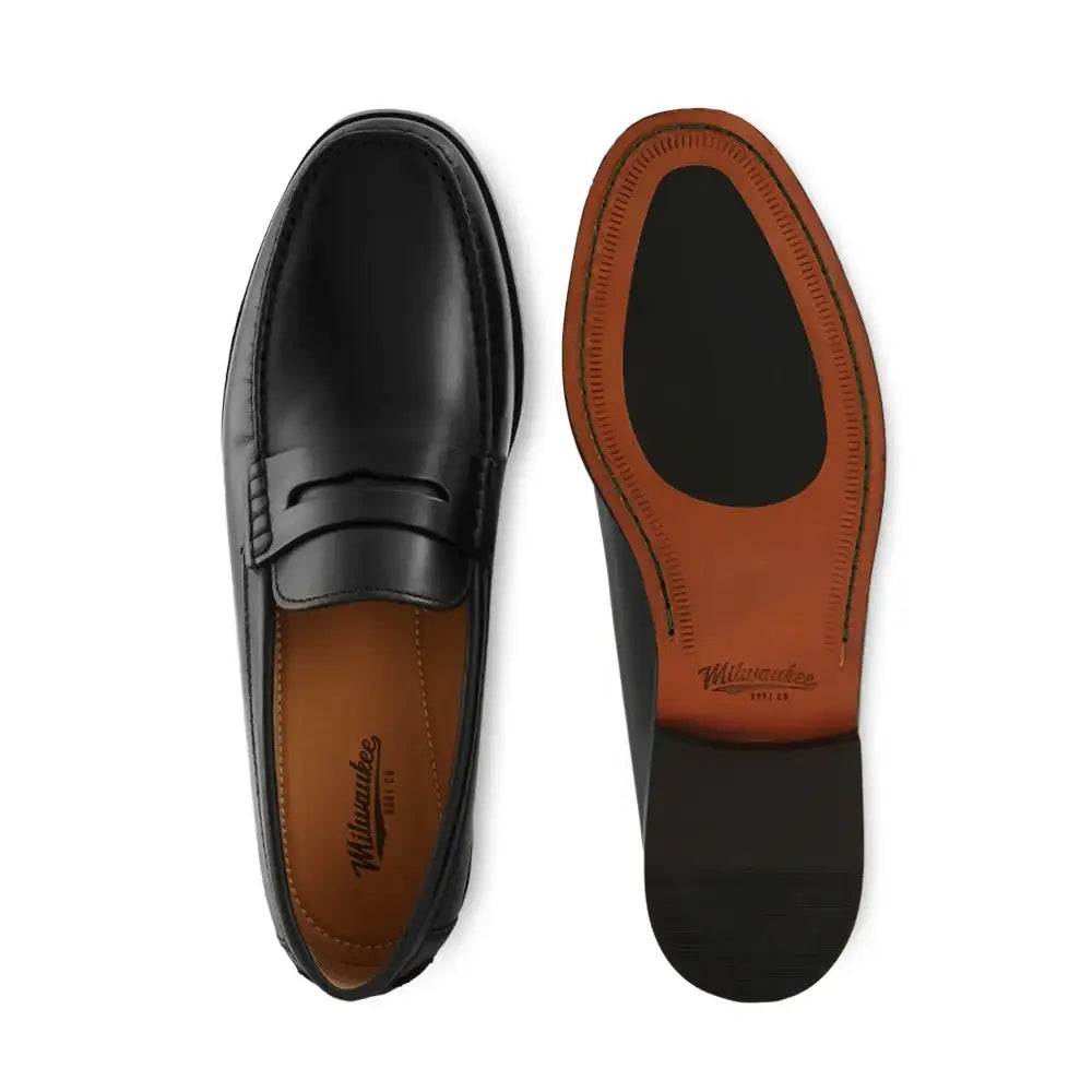 Milwaukee mens penny loafer shown from top and bottom angles revealing leather construction and sole