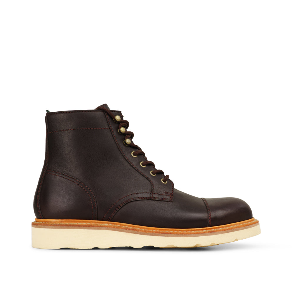 Milwaukee Borchert men's cap toe leather lace-up boot with cream wedge sole, side view