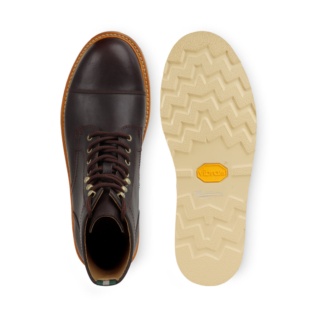 Milwaukee Borchert cap toe boot top view alongside Vibram outsole bottom view