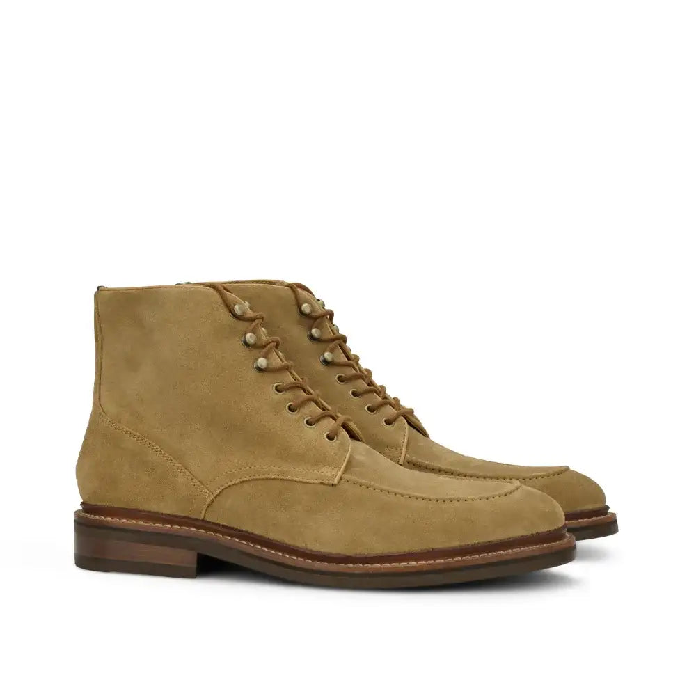 Men's lace-up moc toe ankle boots in suede with stacked leather sole, shown as a pair