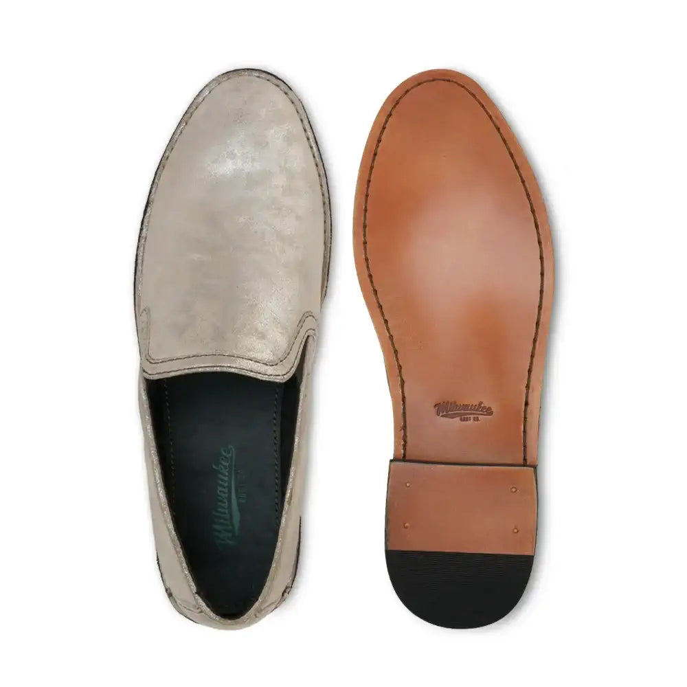 Milwaukee Nellie slip-on loafer shown from top and bottom, displaying leather sole construction