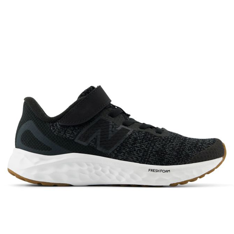 New Balance Fresh Foam Arishi v4 kids sneaker with bungee lace and top strap, lateral view