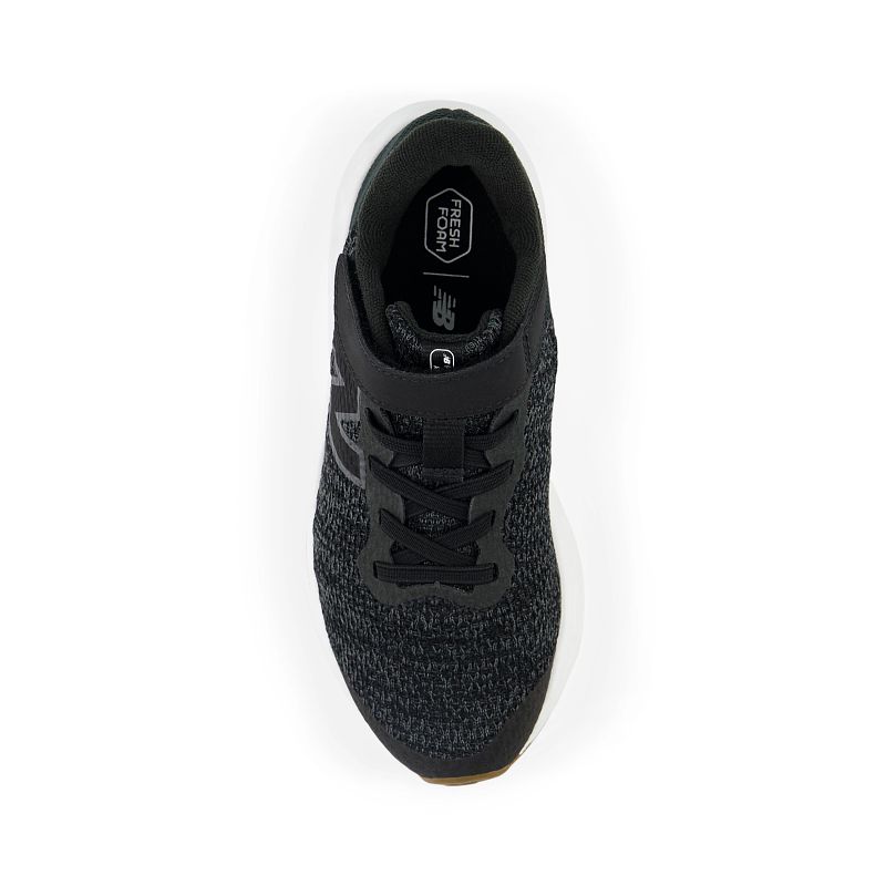 New Balance Fresh Foam Arishi v4 kids sneaker shown from top-down angle with bungee lace and strap