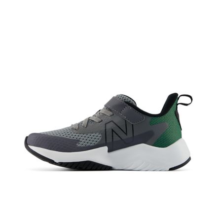 New Balance boys running shoe with bungee lace and top strap closure, lateral view