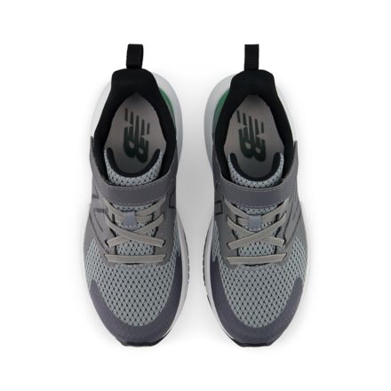 Top-down view of New Balance boys running shoes with bungee lace and hook-and-loop strap