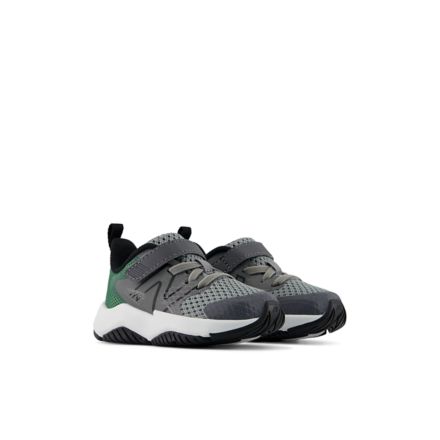 New Balance boys running sneakers with velcro strap, shown in angled pair view