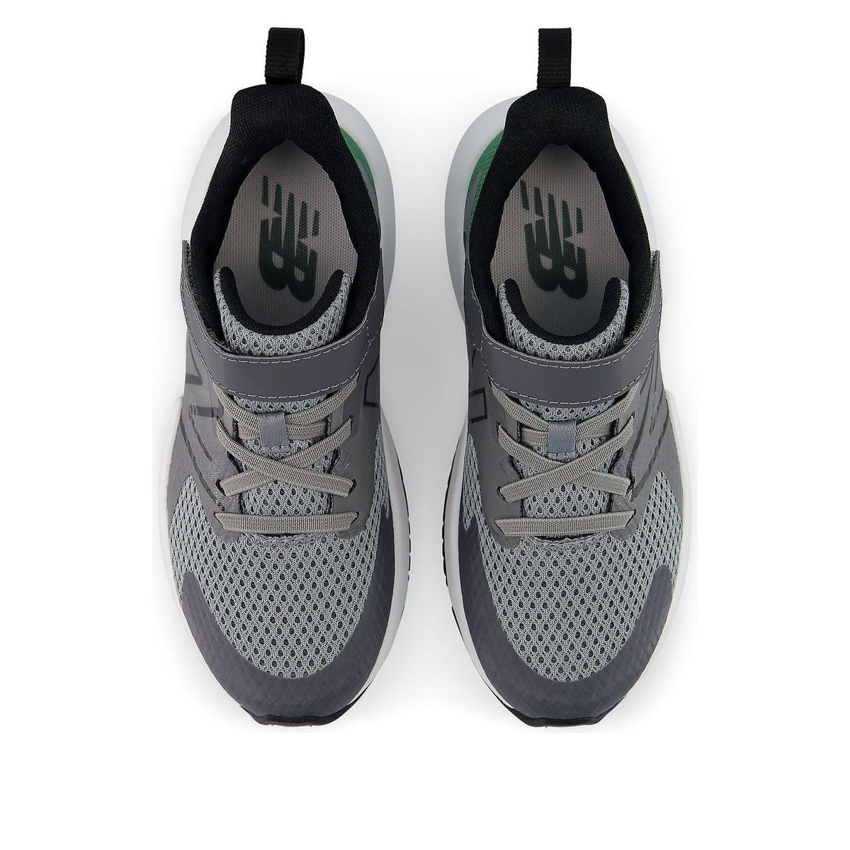 Top-down view of New Balance boys running shoes with bungee lace and strap closure