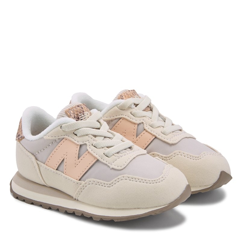 New Balance 237 infant sneakers with laces, suede toe cap, and metallic heel detail