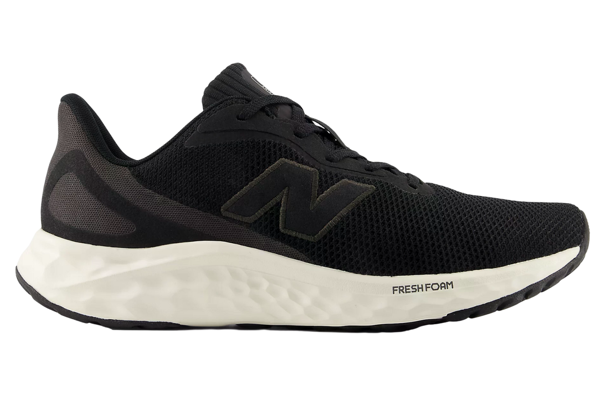 New Balance Fresh Foam running shoe in black mesh with white midsole, lateral view