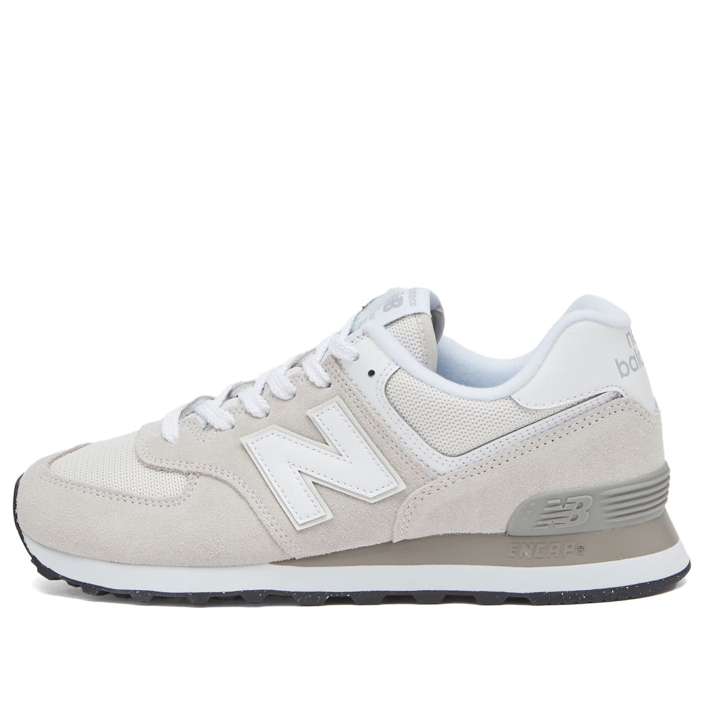 New Balance 574 women's low-top sneaker in light grey suede and mesh, lateral view