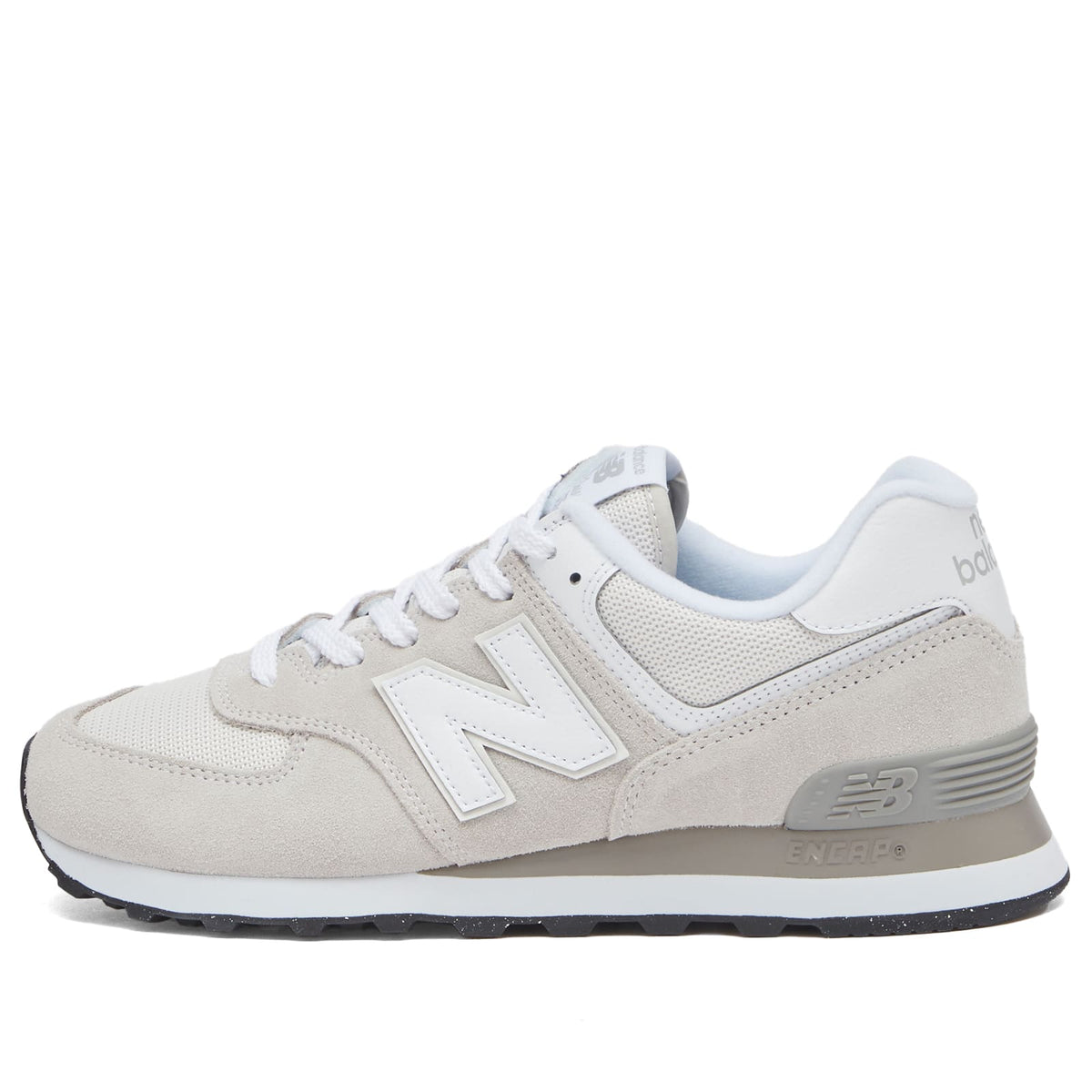 New Balance 574 women's low-top sneaker in light grey suede and mesh, lateral view
