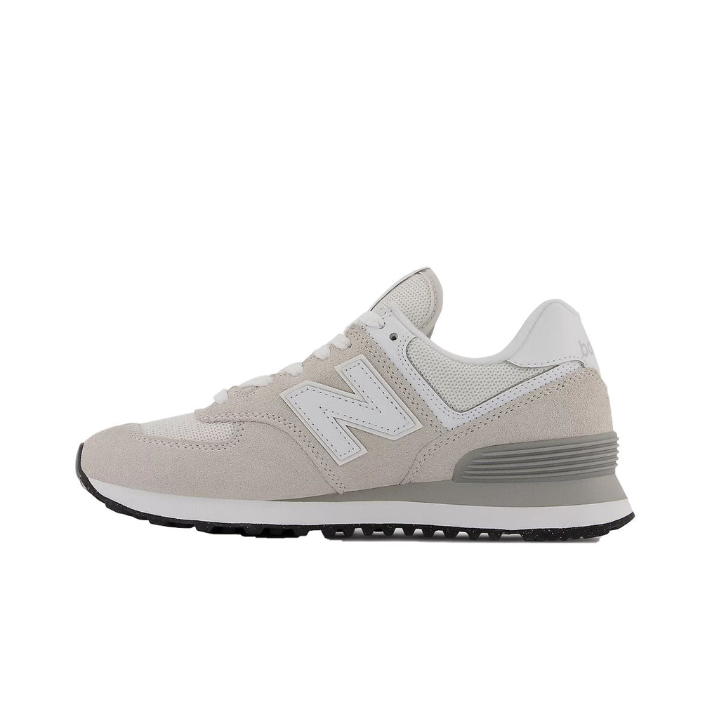 New Balance 574 sneaker in light grey suede and mesh with white N logo, lateral view