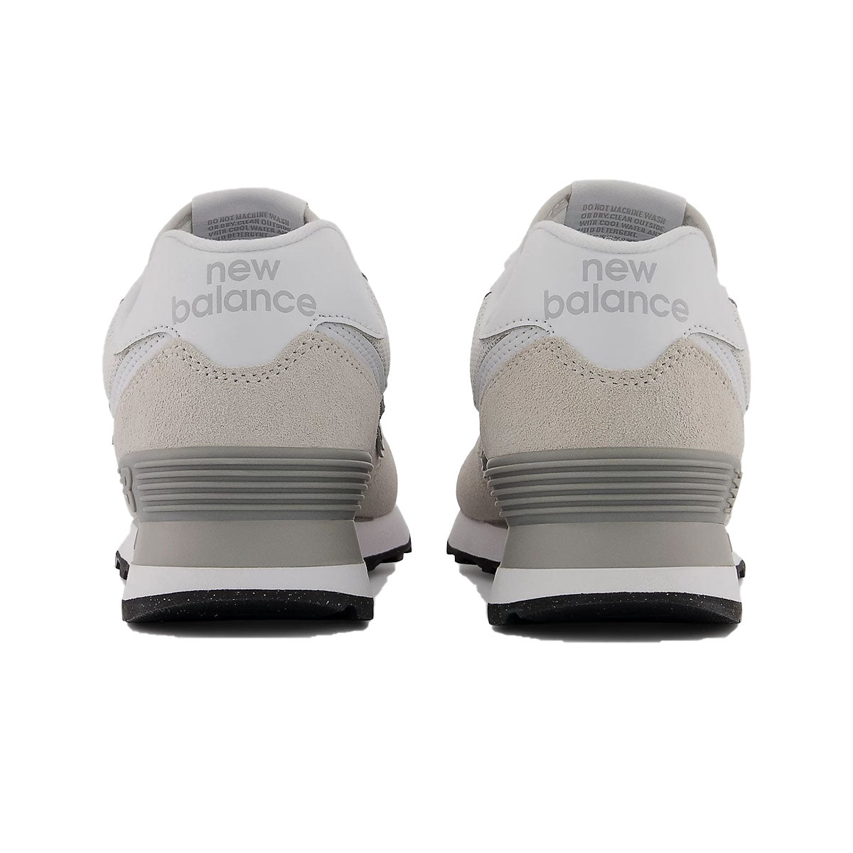 Rear view of New Balance 574 sneakers showing heel counter and midsole details
