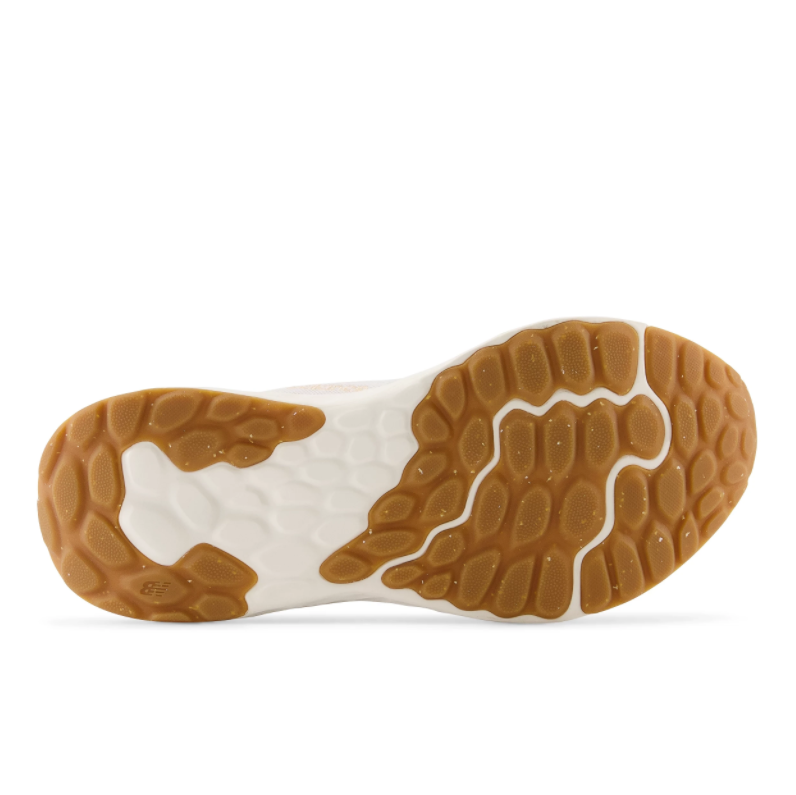 Bottom sole view of New Balance Fresh Foam Arishi v4 sneaker showing gum rubber outsole pattern