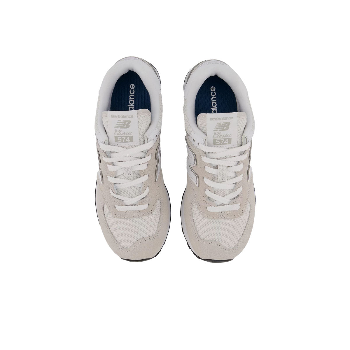 New Balance 574 Classic sneakers shown from above with white laces and blue insoles