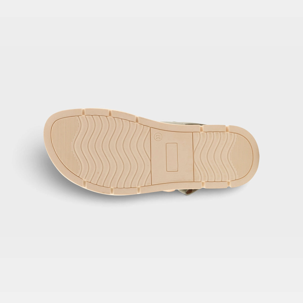 Bottom sole view of a women's sandal showing wavy tread pattern and size marking