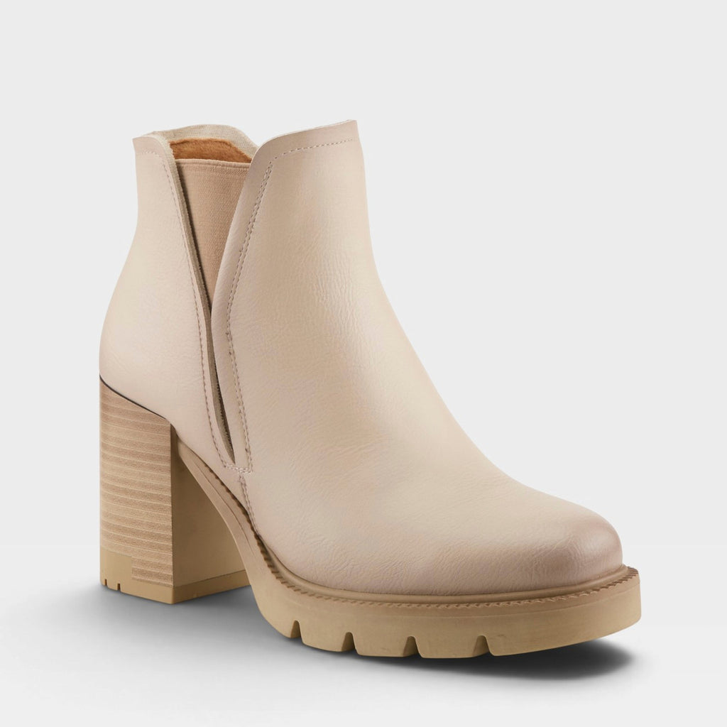 Women's heeled Chelsea ankle boot with lug sole and elastic side panel