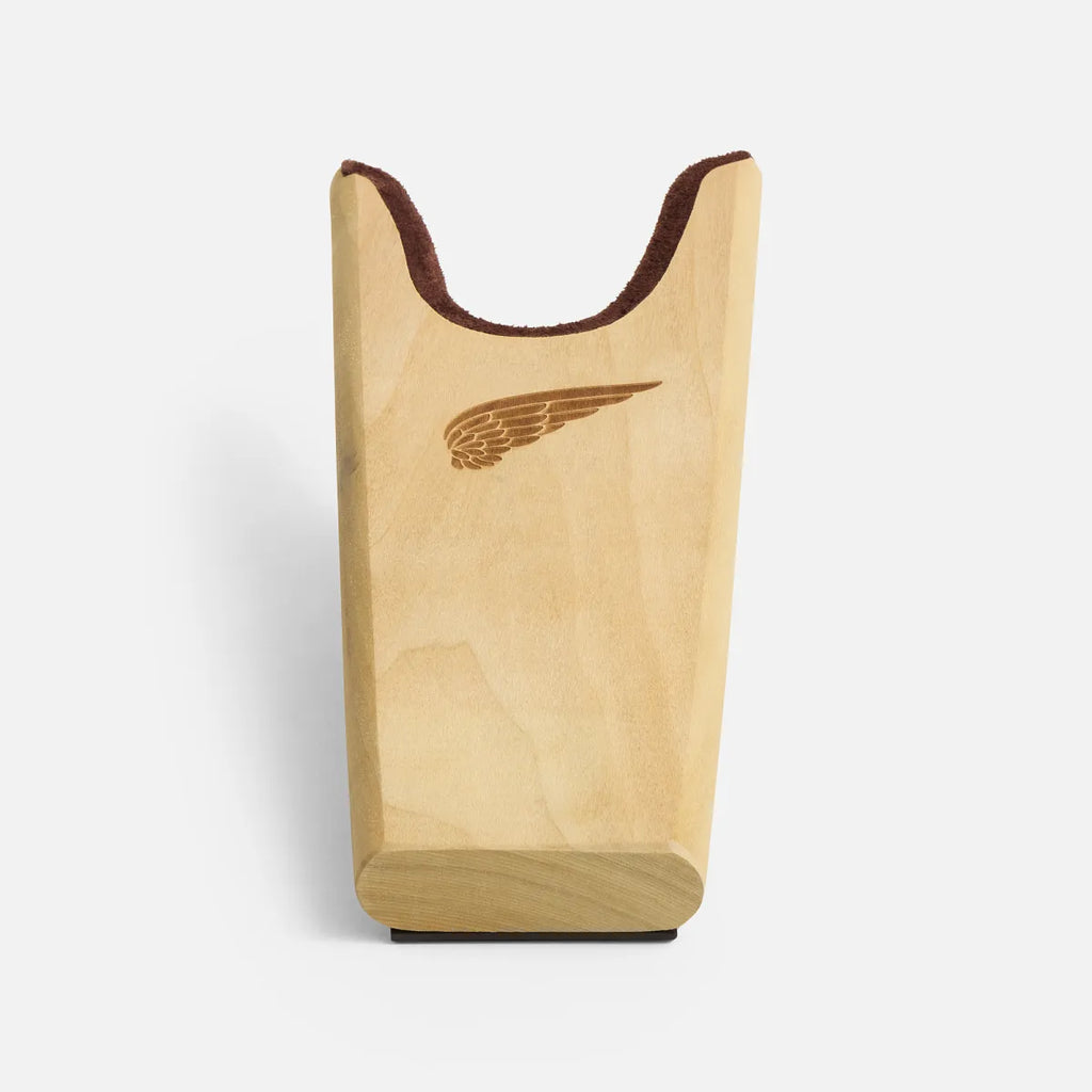 Red Wing wooden boot jack with engraved wing logo and brown suede lining at top
