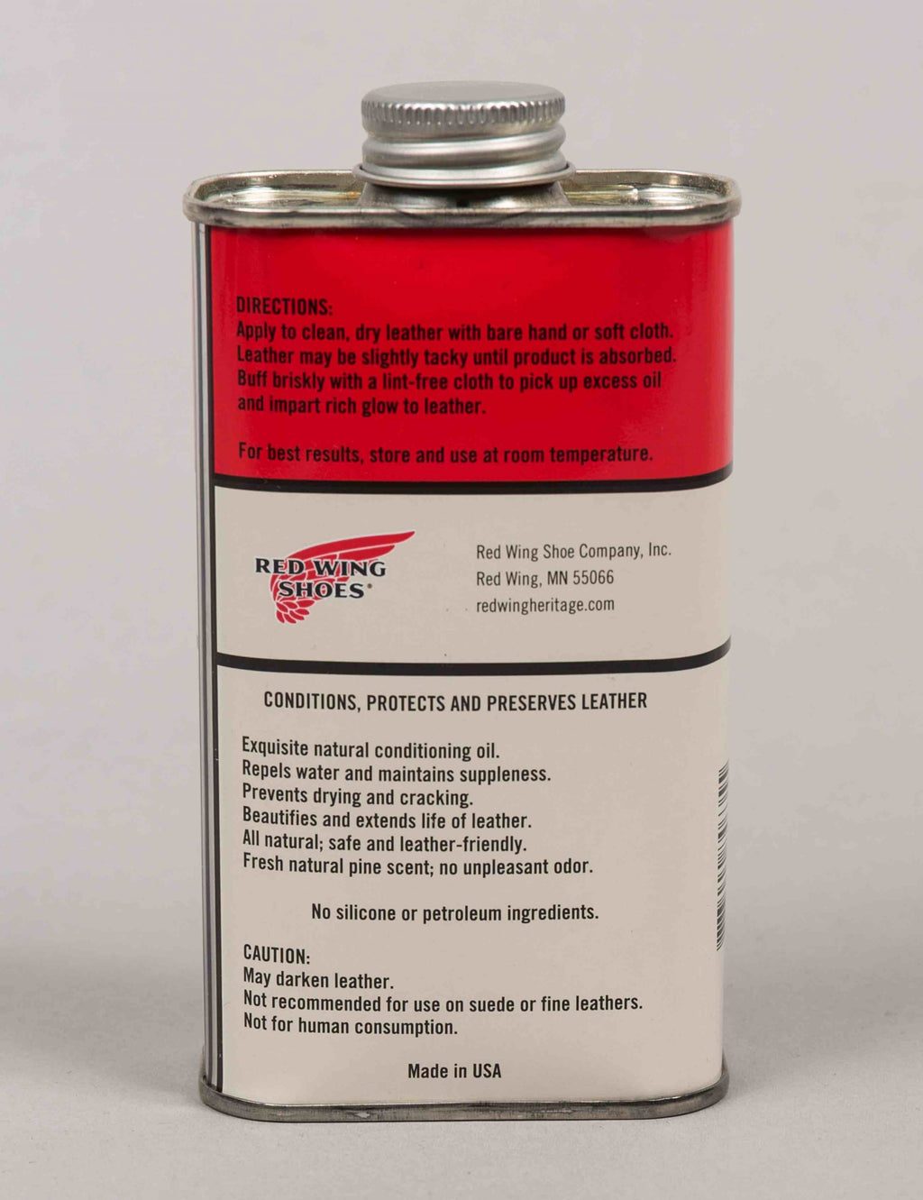 Red Wing Shoes All Natural Boot Oil in metal tin showing back label with directions and features