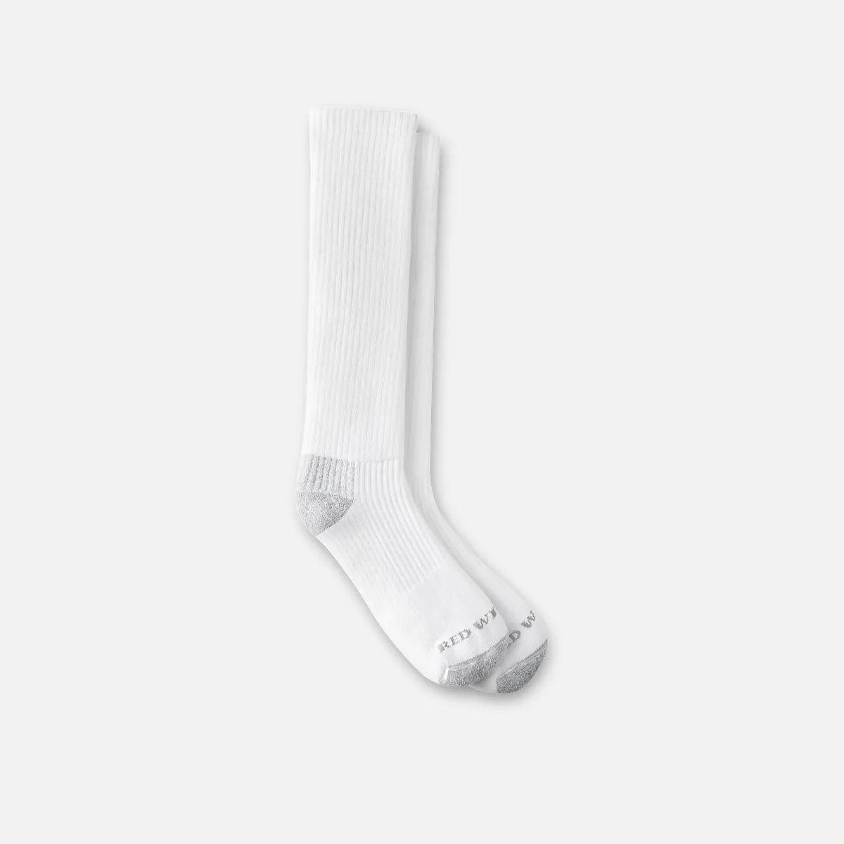 Red Wing over-the-calf crew socks in white with gray heel and toe reinforcement