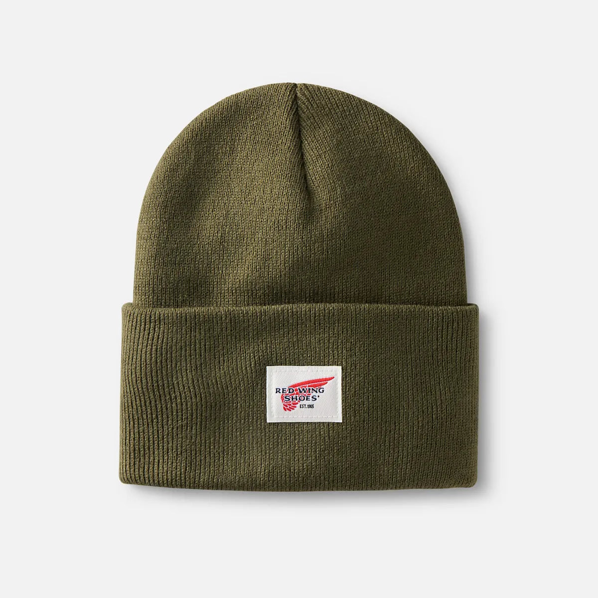 Red Wing Shoes logo knit beanie with folded cuff displayed flat on white background