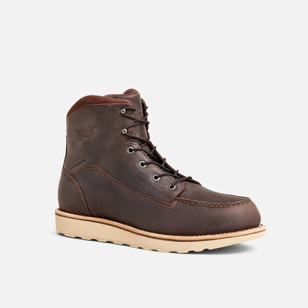 Red Wing mens lace-up leather work boot with moc toe and cream wedge sole