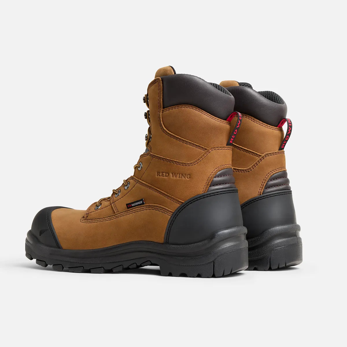 Red Wing men's 8-inch waterproof safety toe work boots shown from rear three-quarter angle