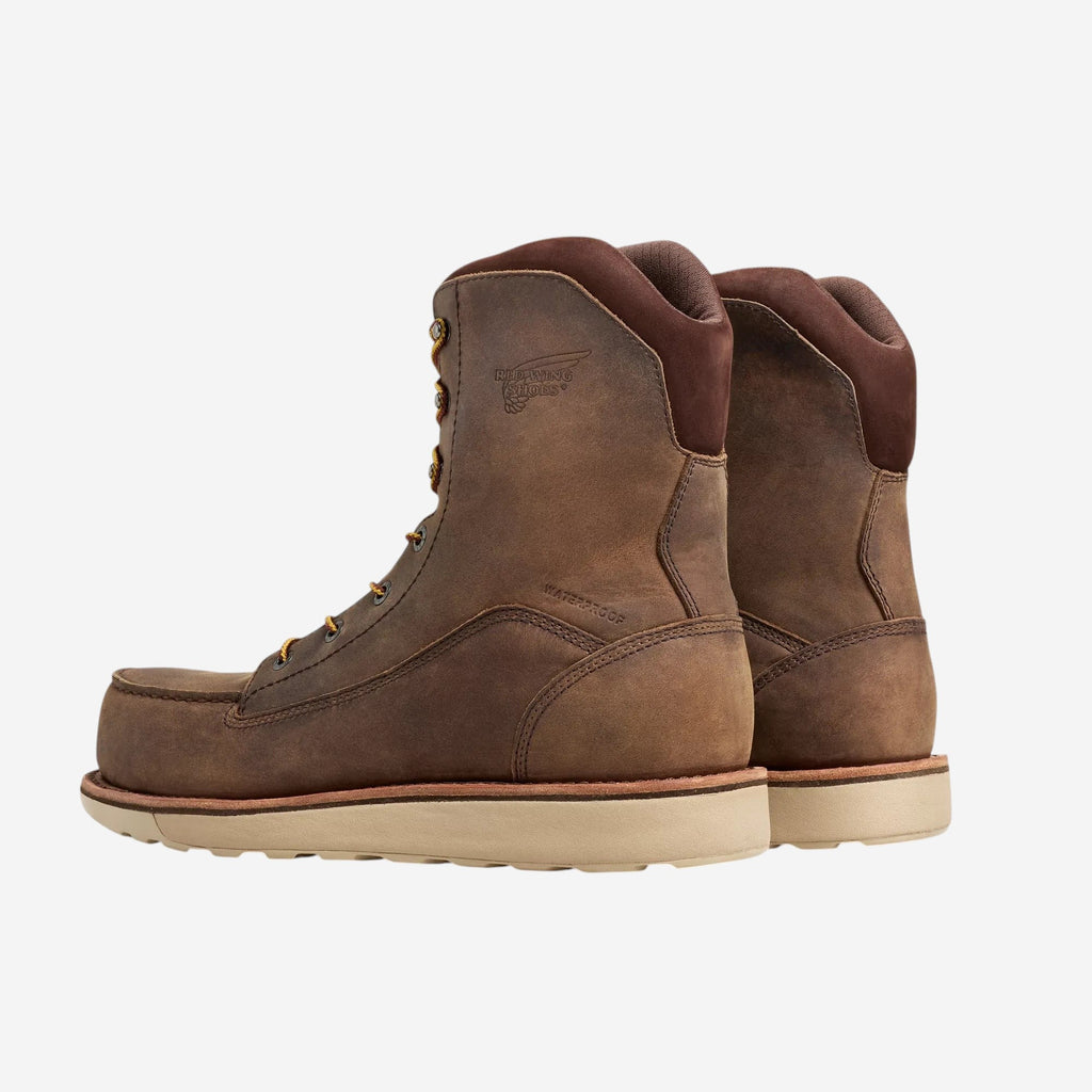 Red Wing mens tall lace-up work boots with moc toe and wedge sole, rear view