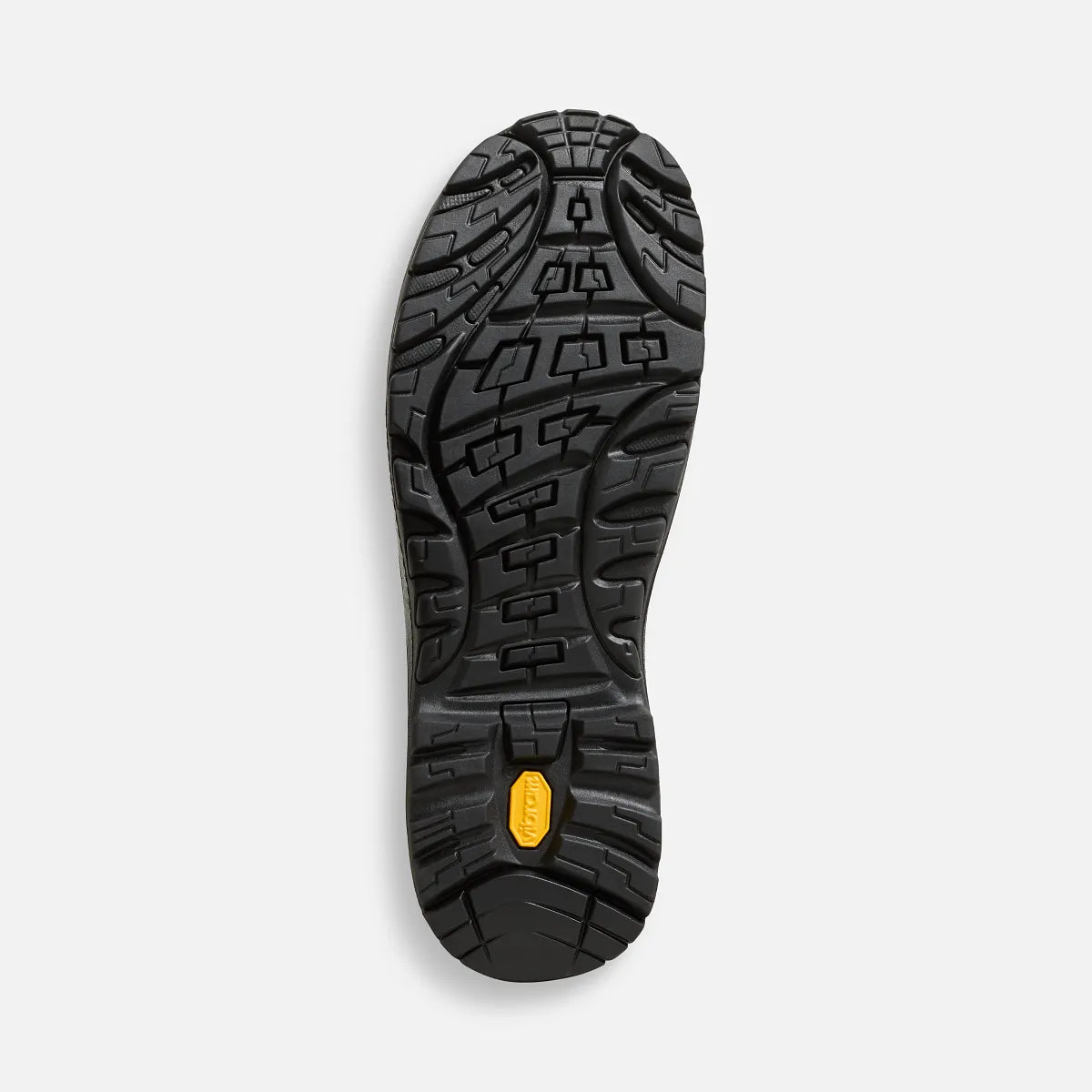 Bottom view of Red Wing safety boot outsole showing aggressive lug tread pattern and brand logo