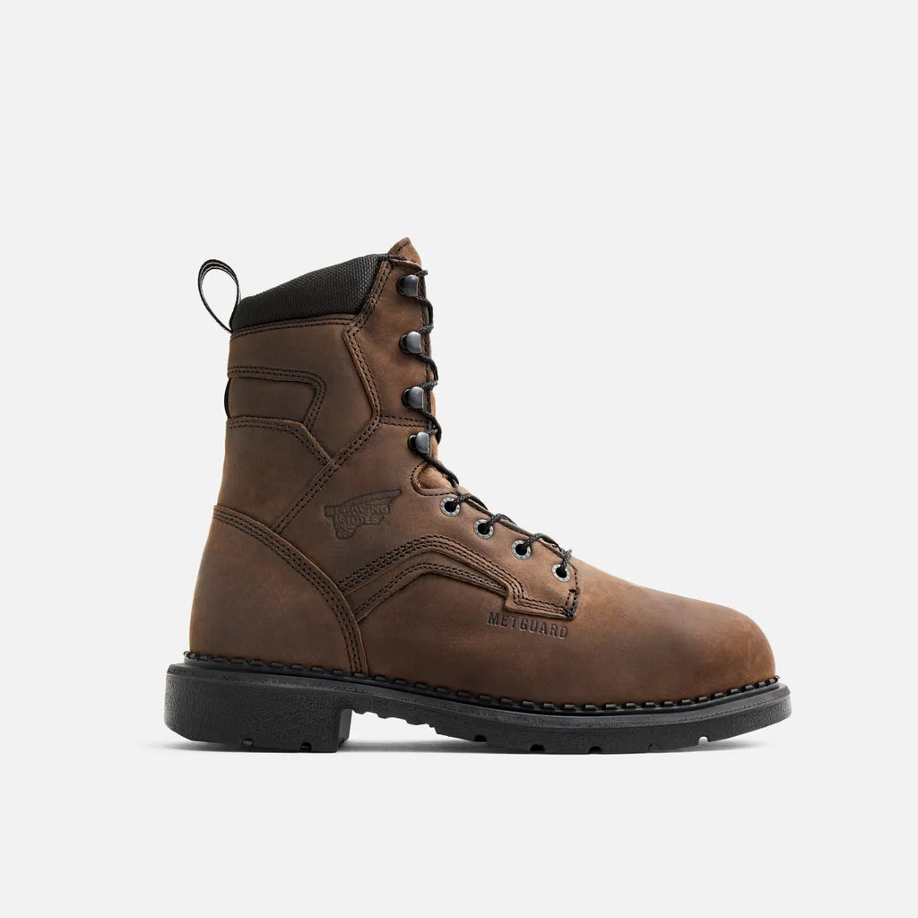 Red Wing mens steel toe metguard work boot with lace-up closure and black rubber outsole