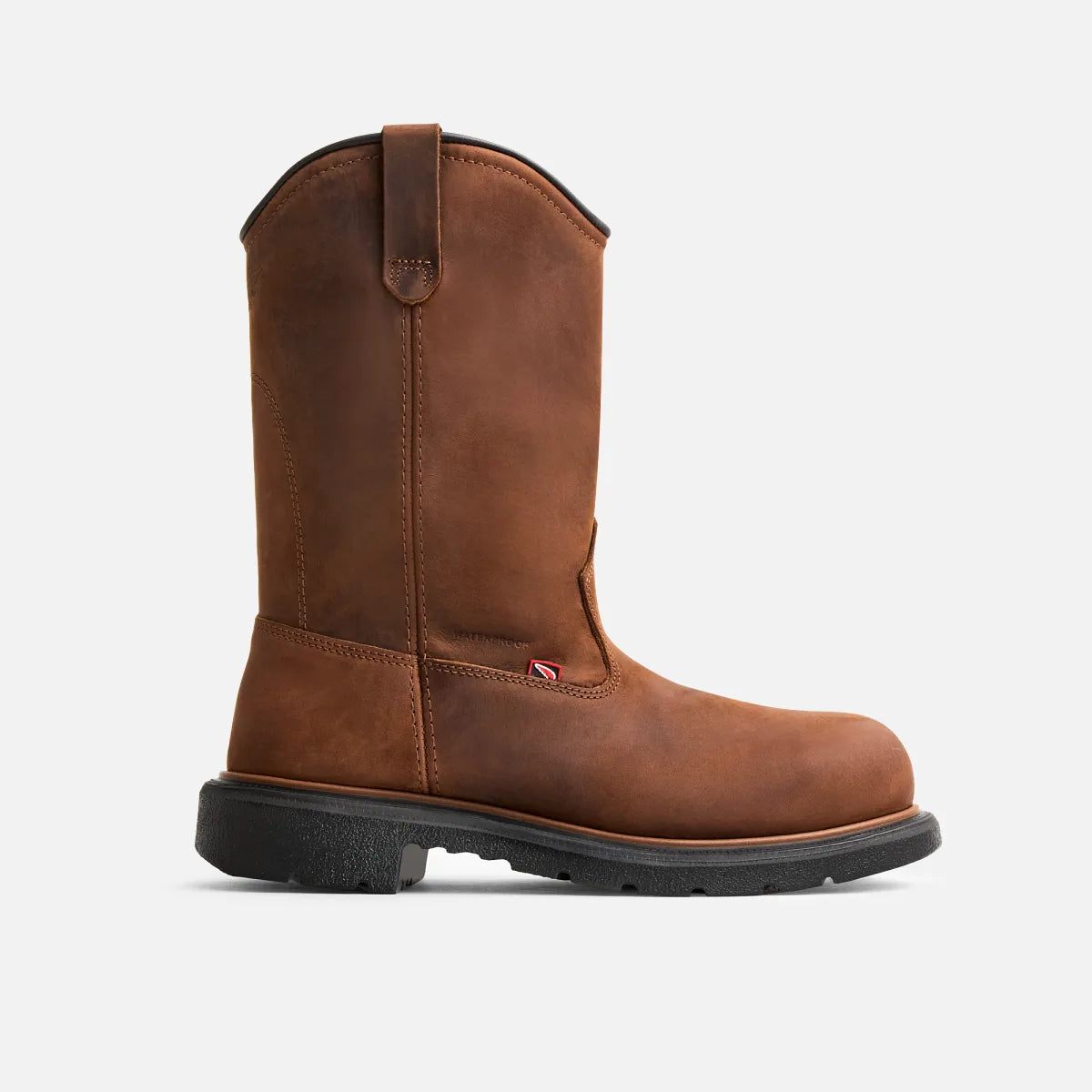 Red Wing pull-on work boot with tall leather shaft and lugged rubber outsole, side view