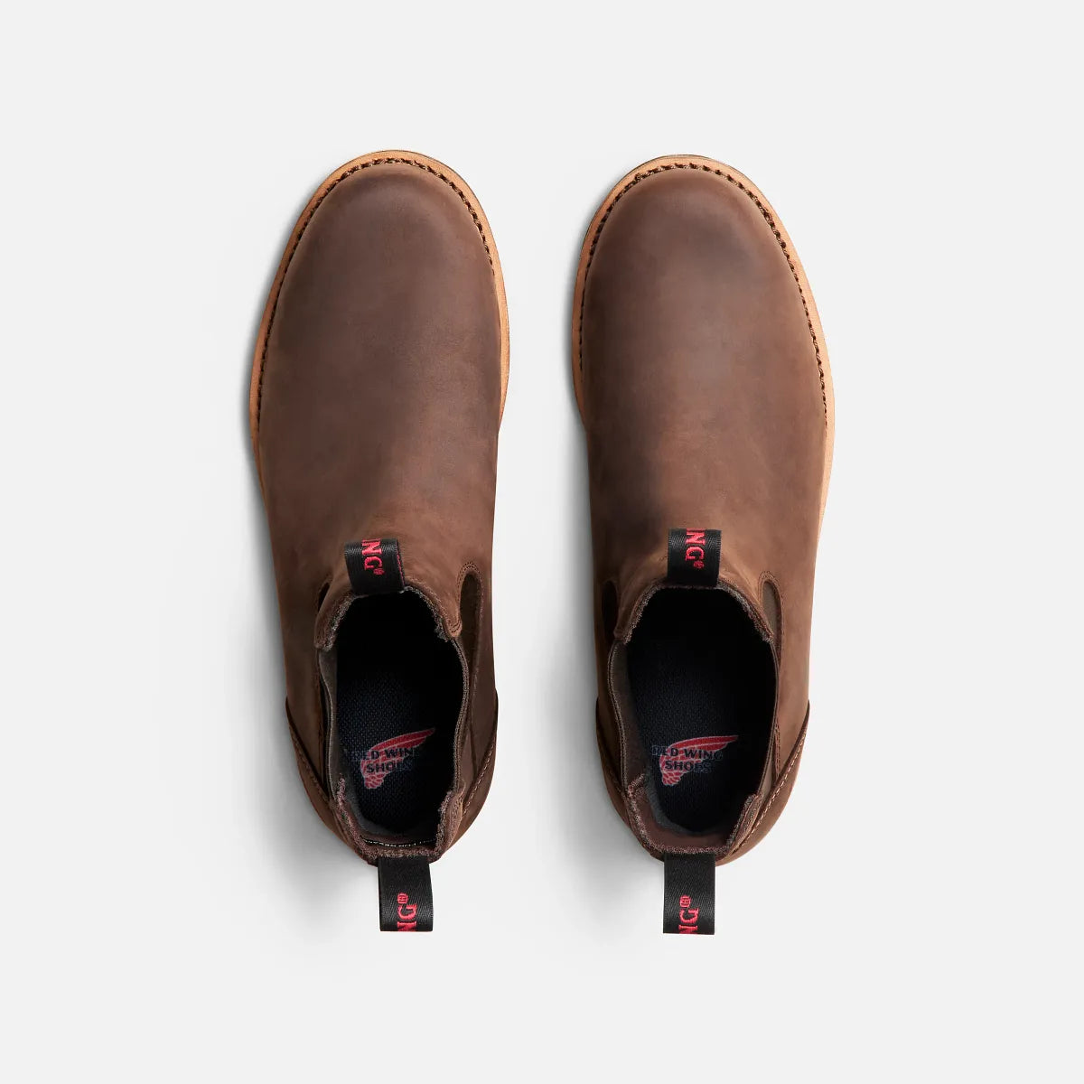 Red Wing Chelsea boots shown from above displaying pull tabs and insole branding