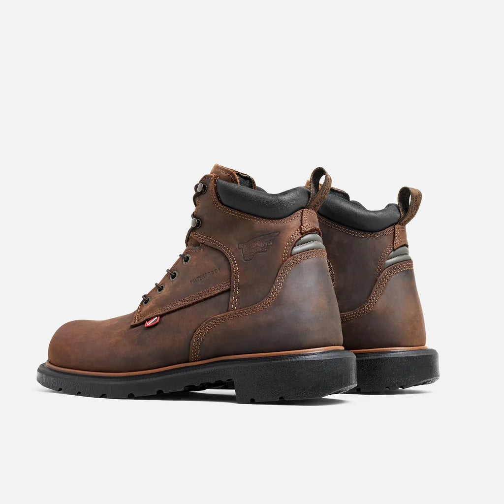 Red Wing Dynaforce 6-inch steel toe waterproof work boots shown from rear angle, pair