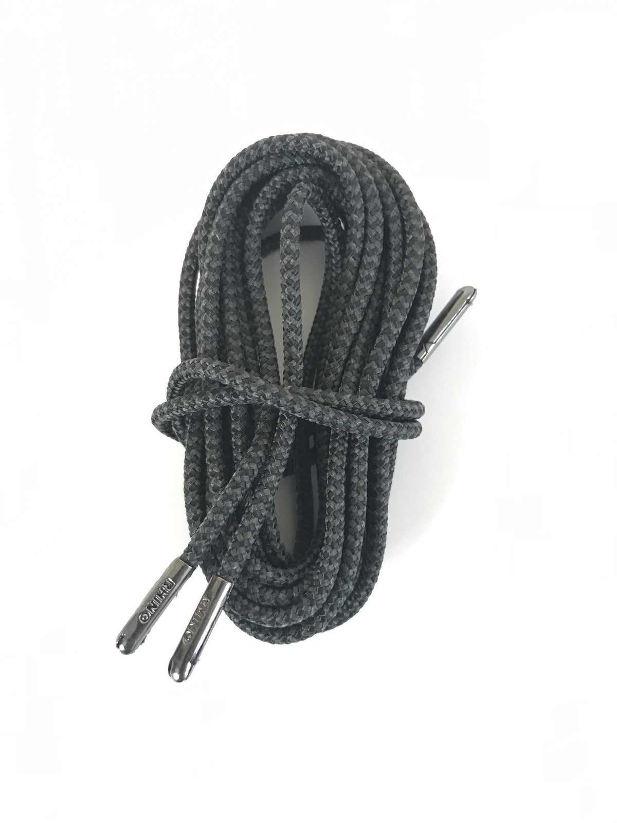 Coiled pair of round black shoelaces with silver metal aglets from Rhino Laces