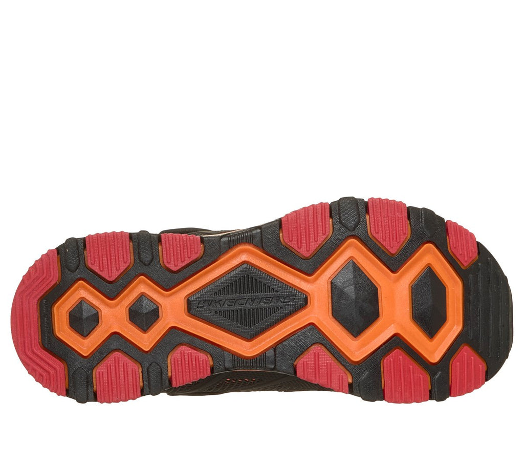Bottom sole view of Skechers boys trail shoe with geometric traction pattern