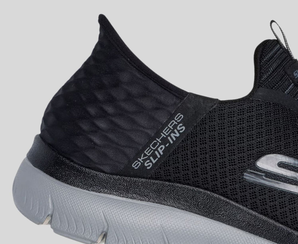 Close-up detail of Skechers Slip-Ins sneaker heel showing mesh upper and Slip-Ins branding