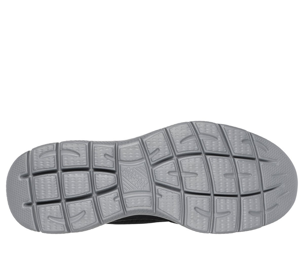Bottom sole view of Skechers men's slip-in sneaker showing textured rubber outsole tread pattern
