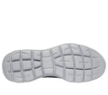 Bottom sole view of Skechers slip-in work sneaker showing tread pattern and flex grooves