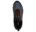Skechers men's trail sneaker with orange laces, top-down view showing Memory Foam insole