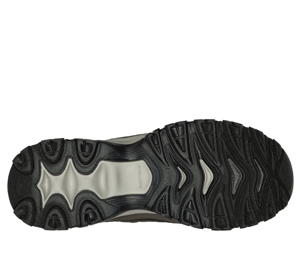 Bottom sole view of Skechers men's slip-in sneaker showing detailed tread pattern