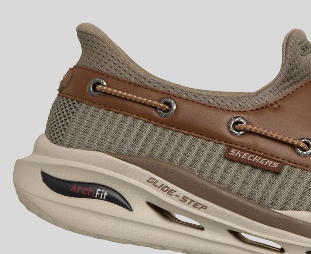 Close-up detail of Skechers Arch Fit Glide-Step slip-on shoe heel and sole technology
